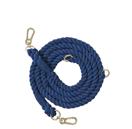 Dog wearing hands-free leash Adjustable rope leash design Cotton rope texture Dog leash in natural setting