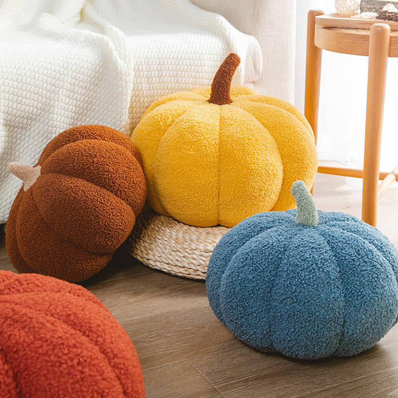 Close-up of soft pumpkin pillow fabric and design