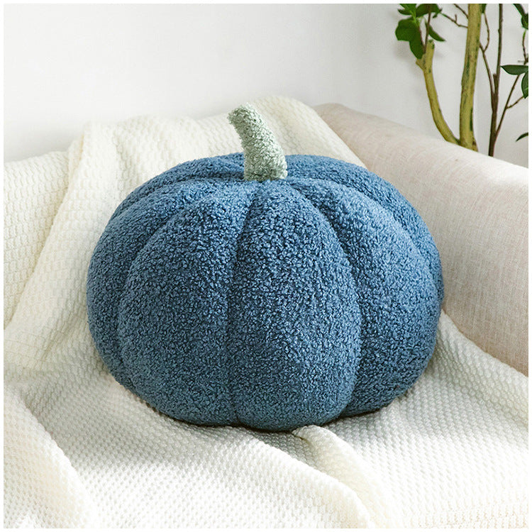 Bright yellow pumpkin cushion enhancing festive vibes
